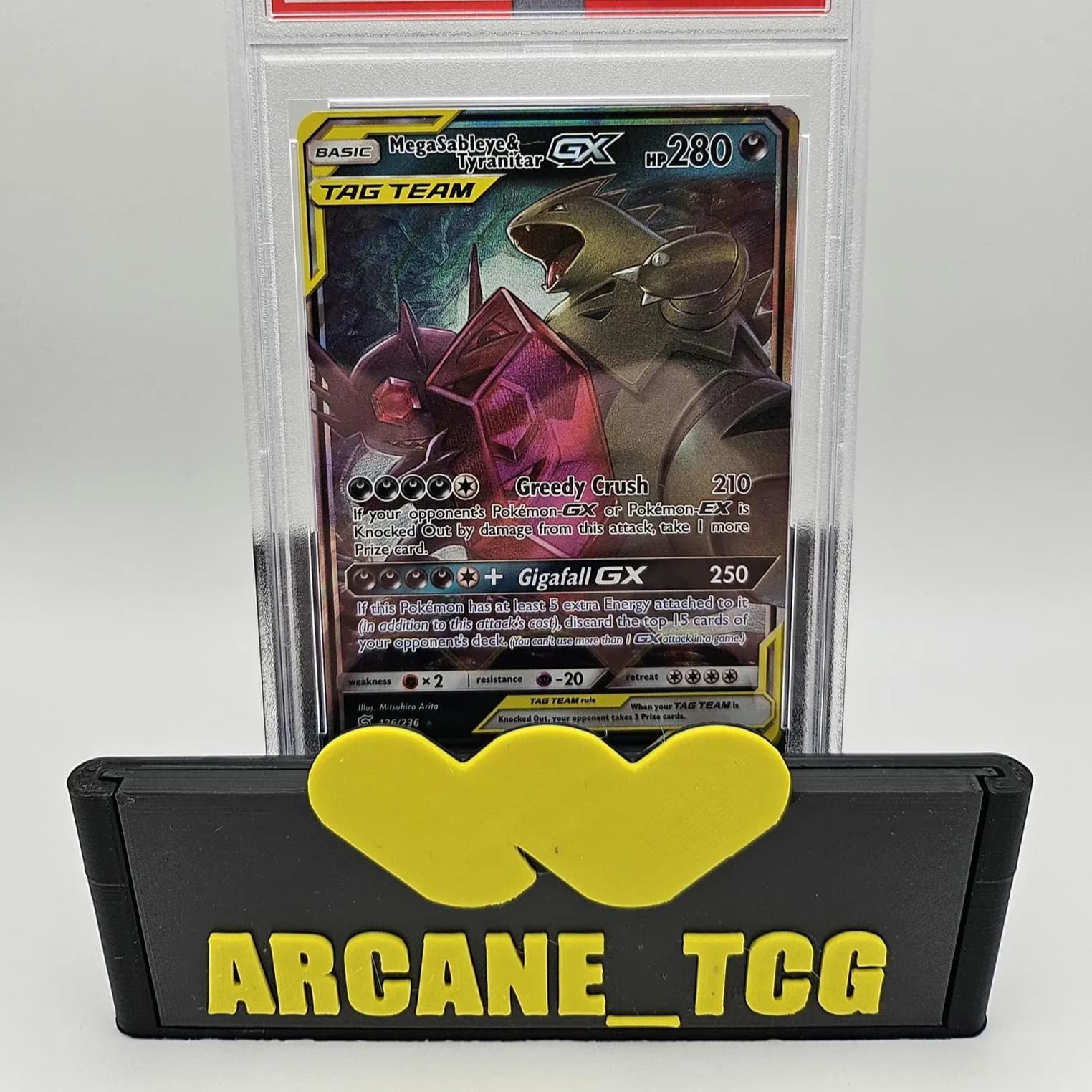 Custom Whatnot logo stand holding a protected trading card